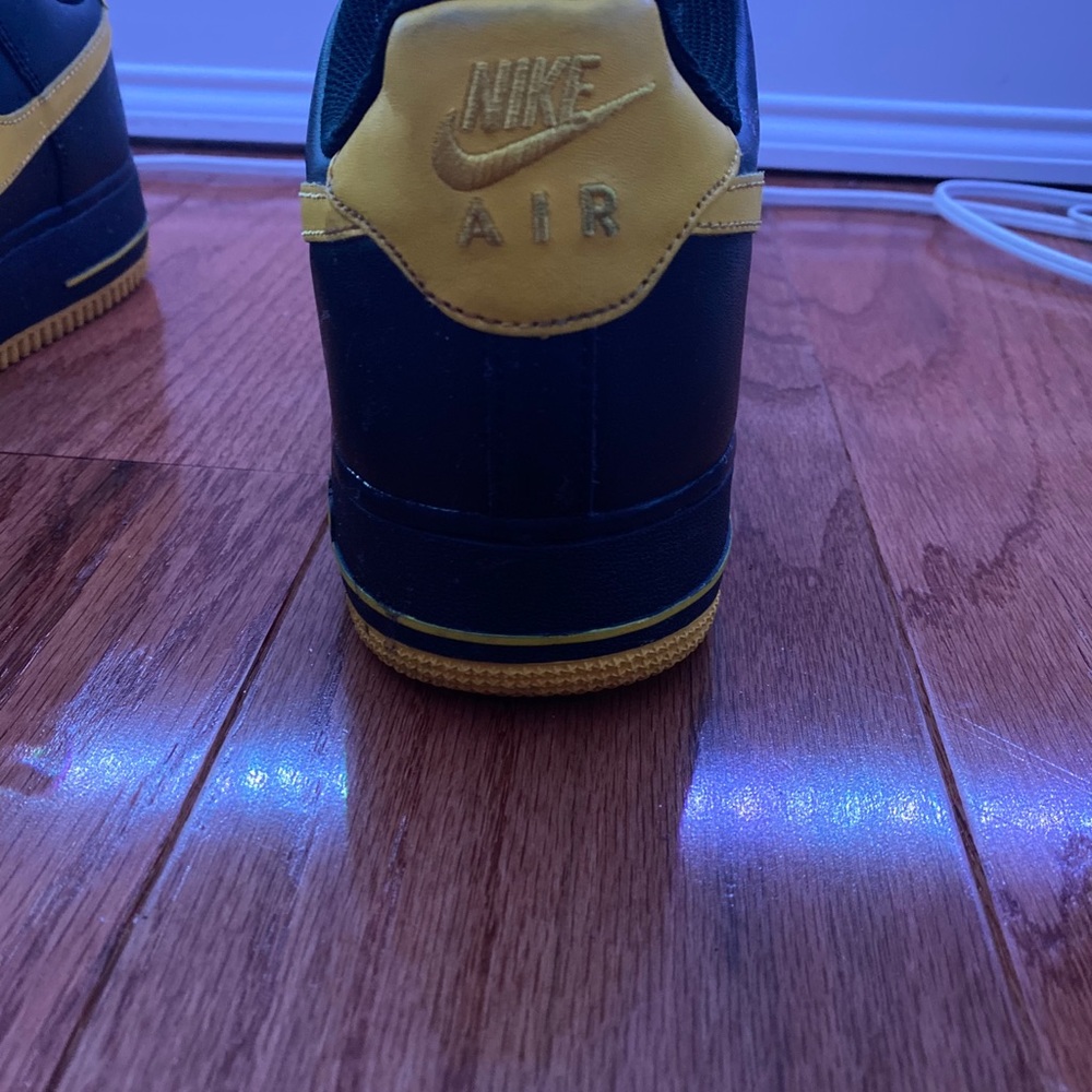 Black and yellow Air Force 1’s